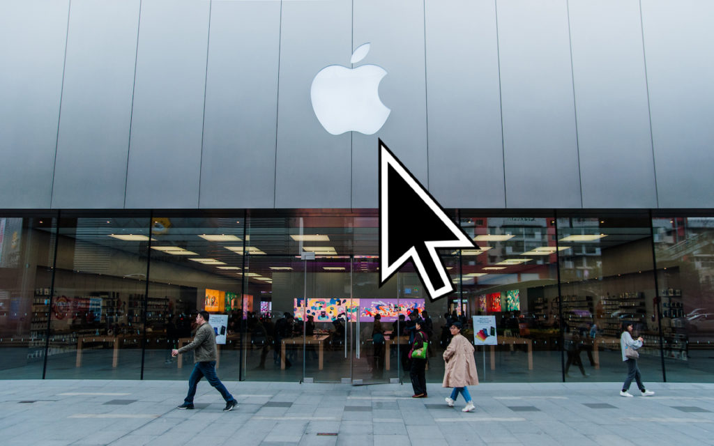 Exterior of an Apple Store with a large Apple logo above the entrance, a giant computer cursor superimposed on the image, and people walking by on the sidewalk.