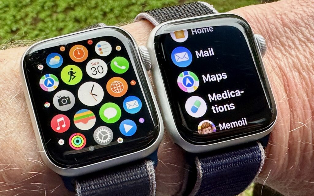 Two Apple Watches on a wrist; the left screen shows colorful app icons, while the right screen displays a list of apps including Mail, Maps, Medications, and Memoji. The background is blurred greenery.