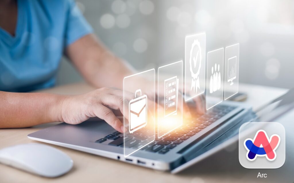 A person types on a laptop with virtual business and job-related icons floating above the keyboard. The Arc logo appears in the lower right corner.