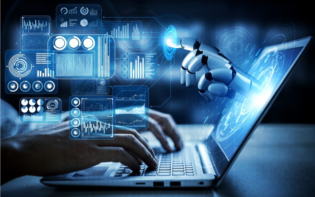 A person types on a laptop while a robotic hand reaches out from the screen, interacting with digital graphs—symbolizing how to make productive use of generative AI chatbots and artbots for seamless human-computer collaboration.