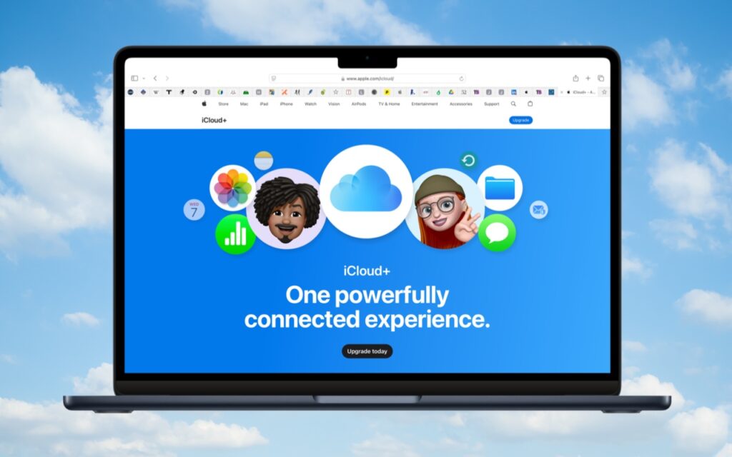 A laptop displays the iCloud+ homepage, featuring a blue background, iCloud logo, app icons, emoji characters, and the text One powerfully connected experience—perfect for Setting Up and Managing iCloud+ Storage. The sky with clouds appears behind the laptop.