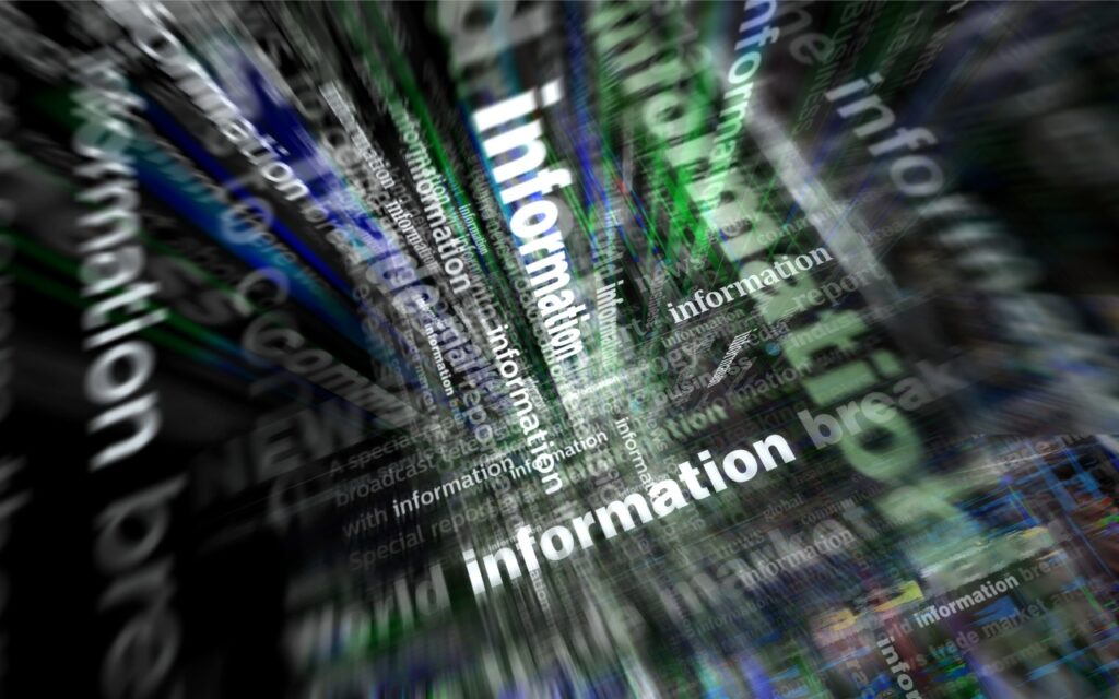Blurred, dynamic image with "information" repeated in various fonts and sizes, evoking data overload and digital motion—perfect for illustrating how to create links to selected text in long web pages for easier navigation.